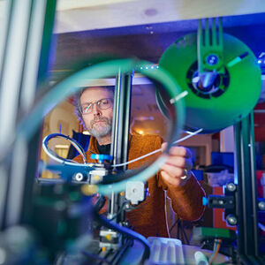 person working at Oulu's FabLab