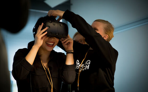 Girl testing VR glasess