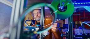 person working at Oulu's FabLab